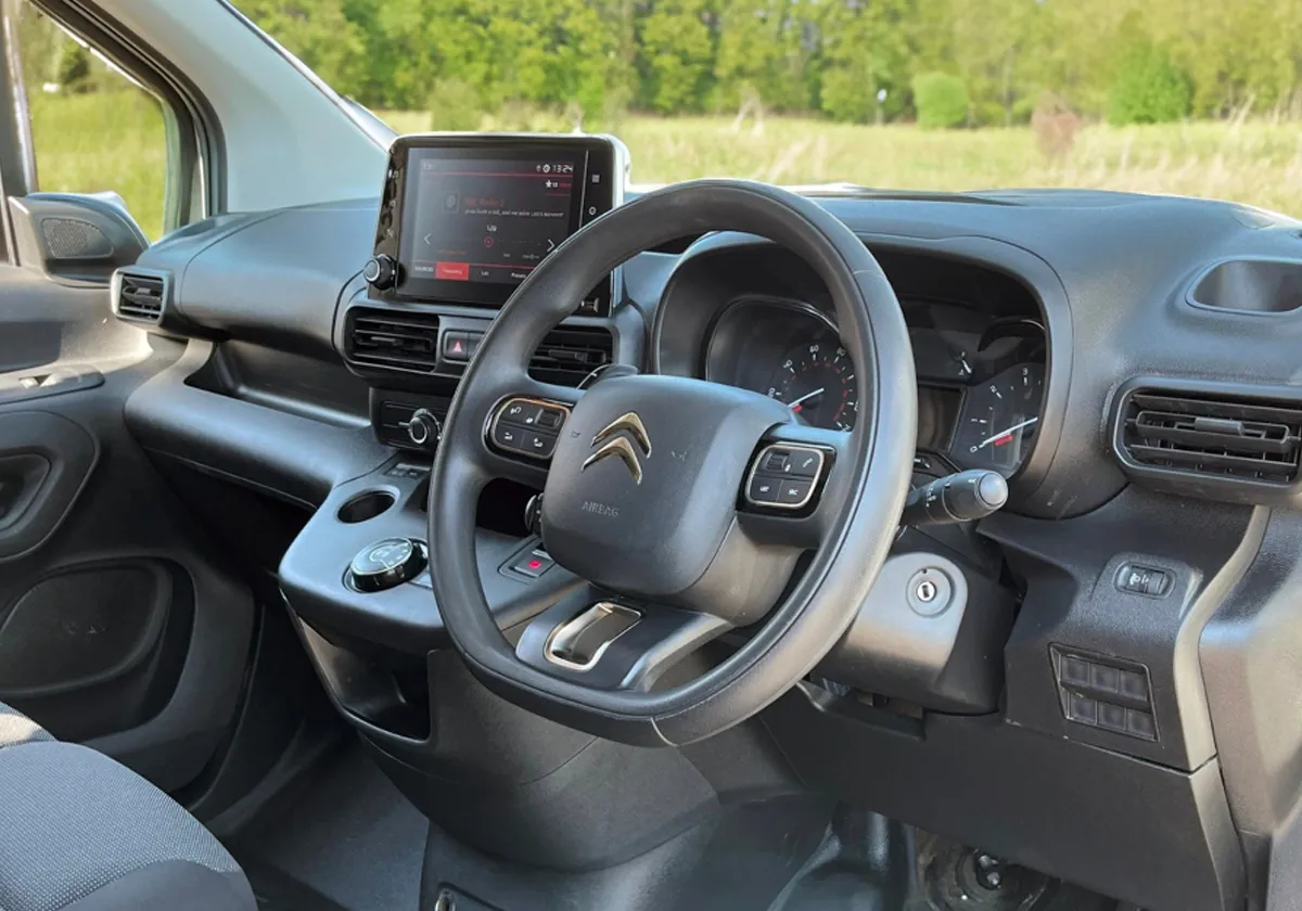 the dashboard and steering wheel of a Citroen Berlingo.
