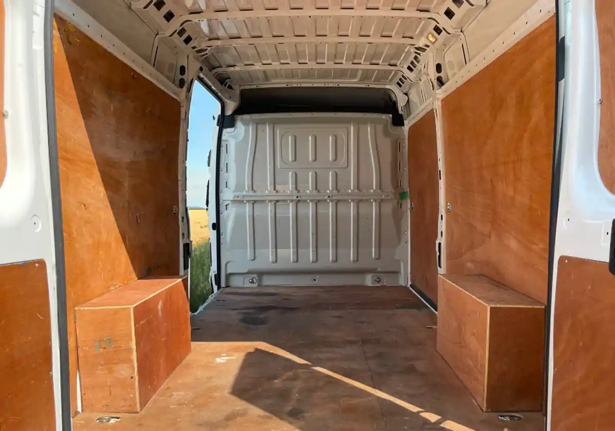 the inside of a Citroen Relay with wooden floors.