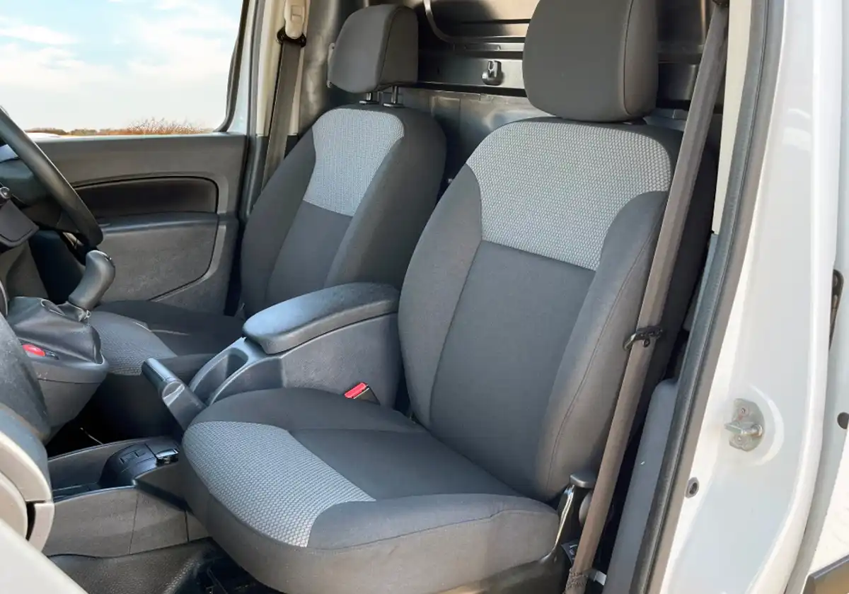 the interior of a Renault Kangoo with gray seats.