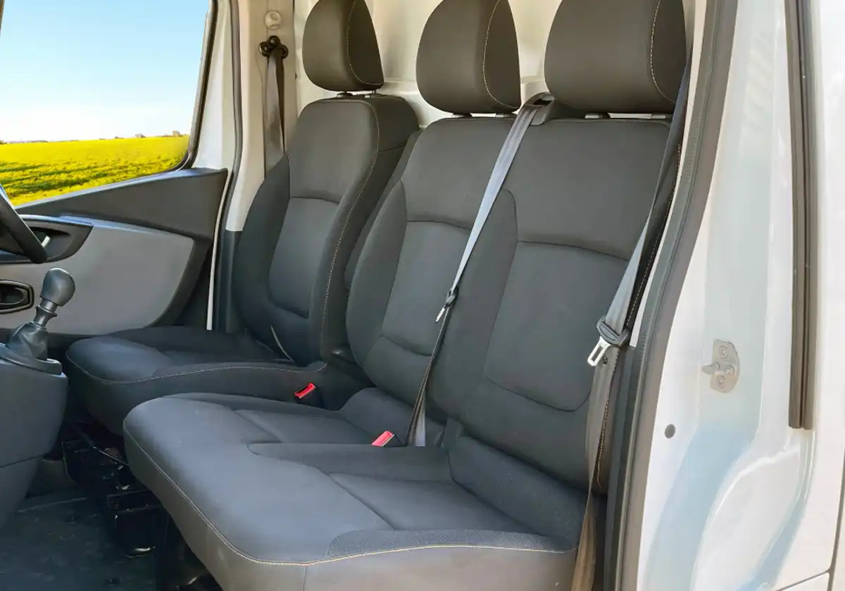 the back seat of a Renault Master with two seats.