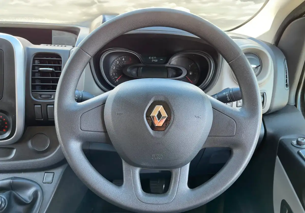 the steering wheel and dashboard of a Renault-Trafic.